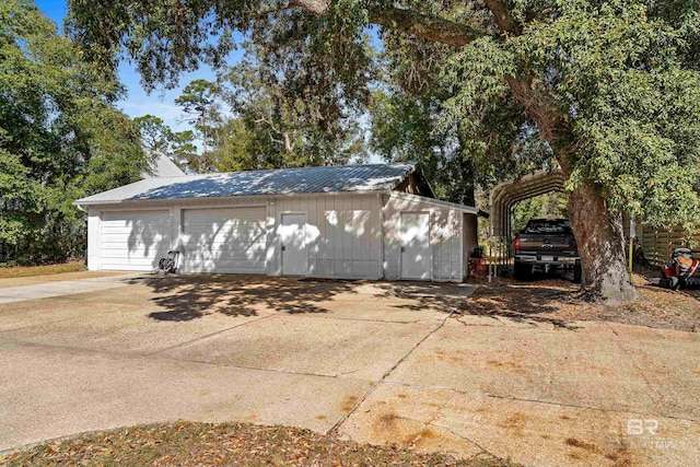 garage with a carport