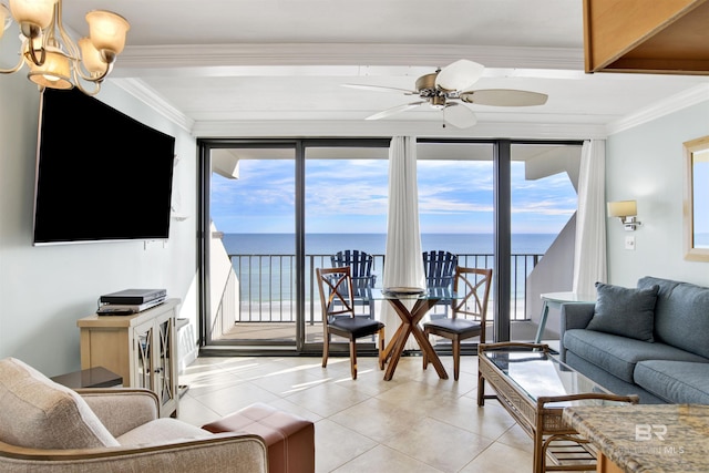 living area featuring light tile patterned floors, ceiling fan with notable chandelier, a water view, and crown molding