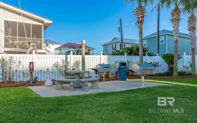 view of yard with a patio and fence