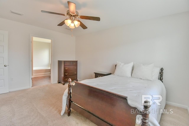 bedroom featuring baseboards, ceiling fan, visible vents, and carpet