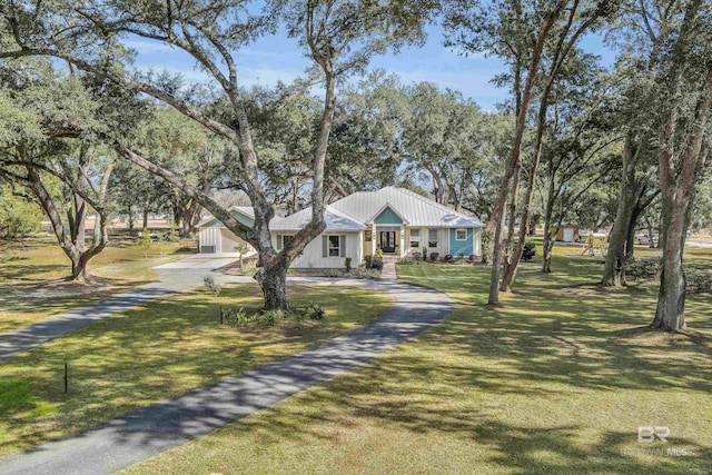 view of front of home with a front lawn