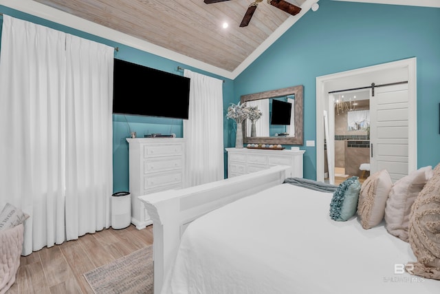 bedroom featuring ensuite bathroom, light hardwood / wood-style floors, vaulted ceiling, wooden ceiling, and a barn door