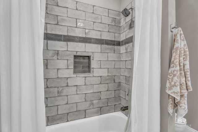 bathroom with shower / bath combination with curtain