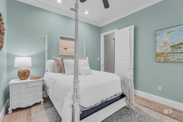 bedroom with wood-type flooring and ceiling fan