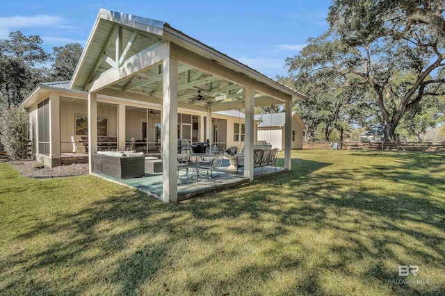 exterior space with an outdoor hangout area and ceiling fan