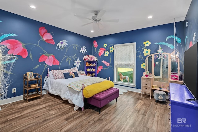 bedroom featuring wood-type flooring and ceiling fan