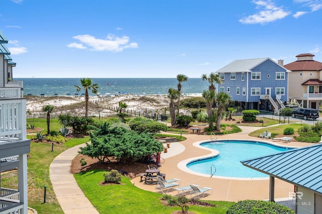 community pool with a water view