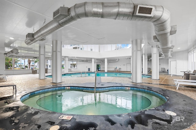 pool with a patio area