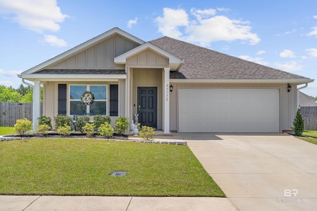 ranch-style house featuring roof with shingles, board and batten siding, fence, and a front lawn