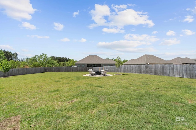 view of yard featuring a fenced backyard and a patio