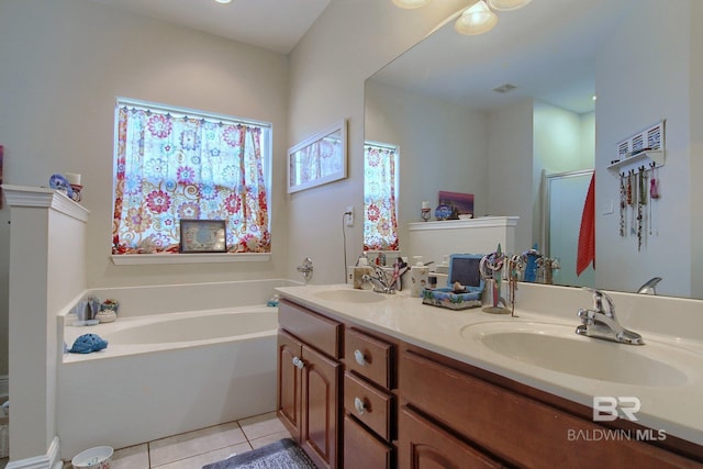 1912 Brigadoon Trl, Gulf Shores, AL 36542 - bathroom with double vanity, a garden tub, tile patterned flooring, and a shower with curtain