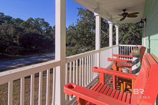 1912 Brigadoon Trl, Gulf Shores, AL 36542 - wooden terrace with ceiling fan
