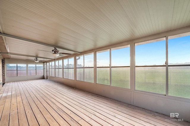 unfurnished sunroom with a sauna and a ceiling fan