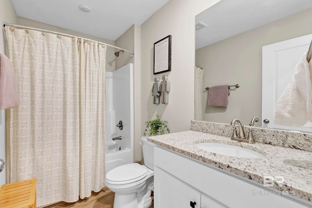 1203 Hayward Loop, Foley, AL 36535 - bathroom with visible vents, toilet, shower / tub combo with curtain, wood finished floors, and vanity