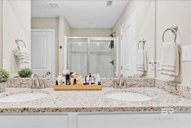 1203 Hayward Loop, Foley, AL 36535 - full bath featuring visible vents, a sink, and a shower stall