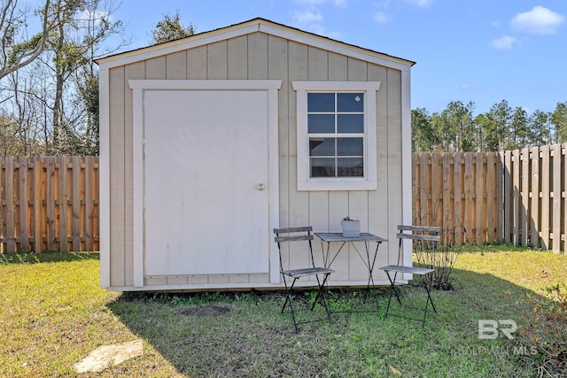 1203 Hayward Loop, Foley, AL 36535 - view of shed with a fenced backyard