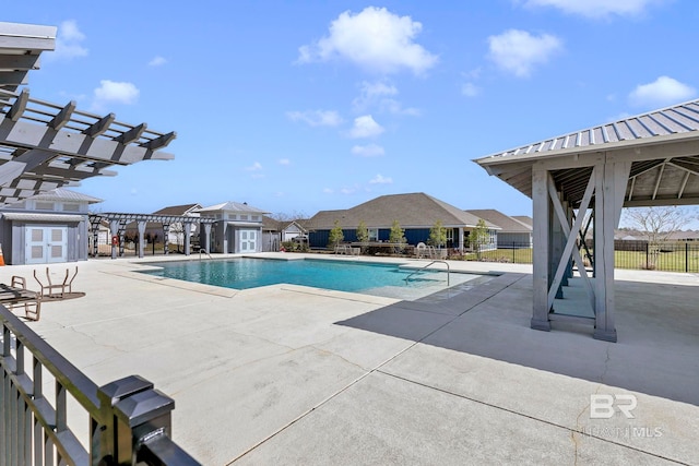 1203 Hayward Loop, Foley, AL 36535 - pool featuring a patio area, fence, and a pergola