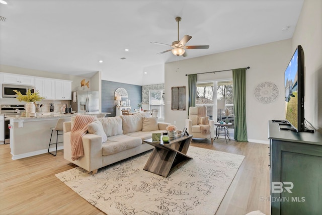 1203 Hayward Loop, Foley, AL 36535 - living room with baseboards, ceiling fan, light wood finished floors, and recessed lighting