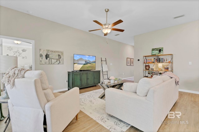 1203 Hayward Loop, Foley, AL 36535 - living room with baseboards, visible vents, and light wood finished floors