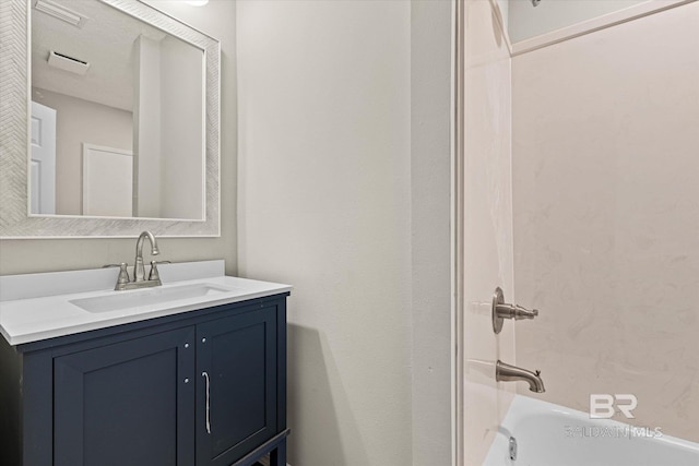 full bathroom with vanity and  shower combination