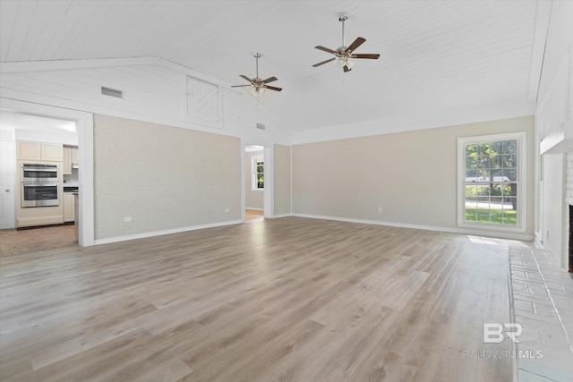 unfurnished living room featuring light wood finished floors, baseboards, visible vents, and ceiling fan