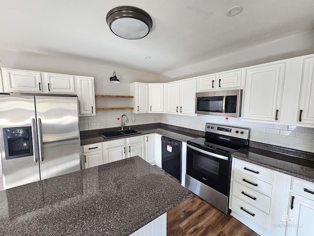 kitchen featuring sink, white cabinets, and appliances with stainless steel finishes