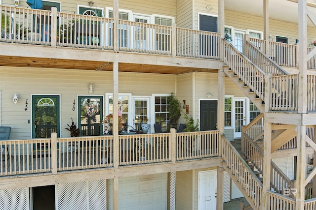 4 Yacht Club Dr Unit 174, Daphne, AL 36526 - view of exterior entry with an attached garage and covered porch