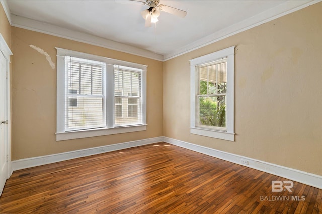 121 Westwood St, Mobile, AL 36606 - spare room with hardwood / wood-style flooring, a wealth of natural light, ornamental molding, and baseboards