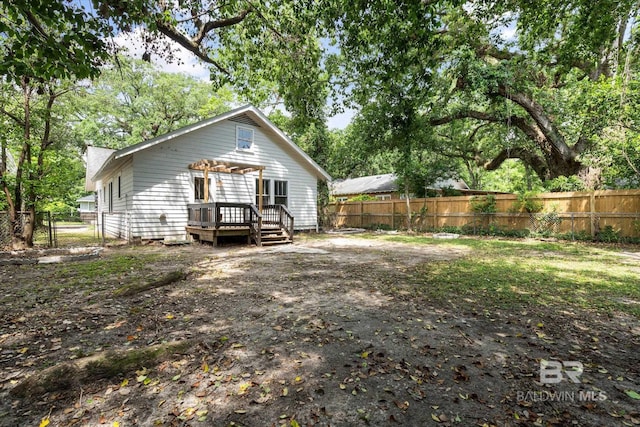 121 Westwood St, Mobile, AL 36606 - back of property with a wooden deck and a fenced backyard