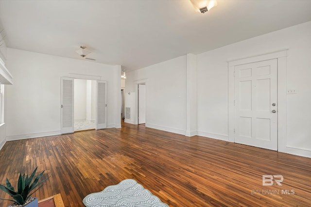 121 Westwood St, Mobile, AL 36606 - unfurnished living room featuring wood-type flooring, baseboards, and visible vents