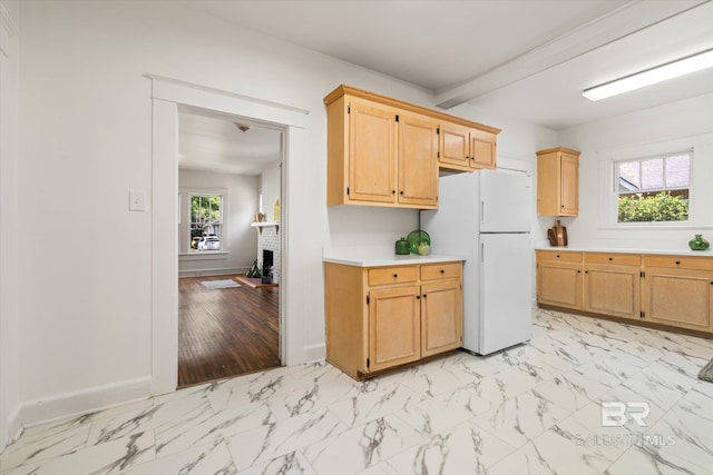 121 Westwood St, Mobile, AL 36606 - kitchen featuring a healthy amount of sunlight, light countertops, and freestanding refrigerator