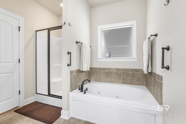 bathroom with shower with separate bathtub and tile patterned floors