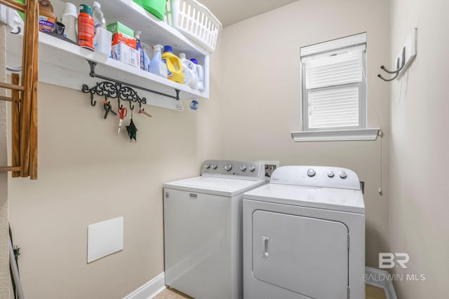 laundry area featuring separate washer and dryer