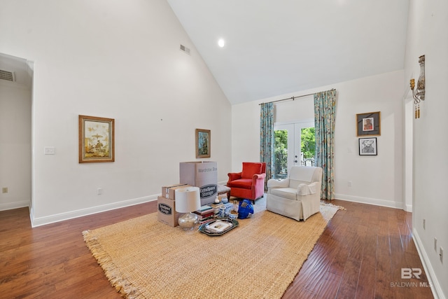 living room with baseboards, high vaulted ceiling, french doors, and wood-type flooring