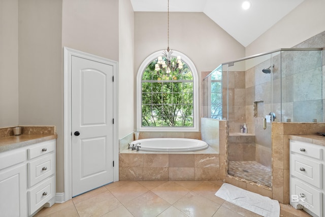 full bath featuring a bath, a shower stall, and tile patterned floors