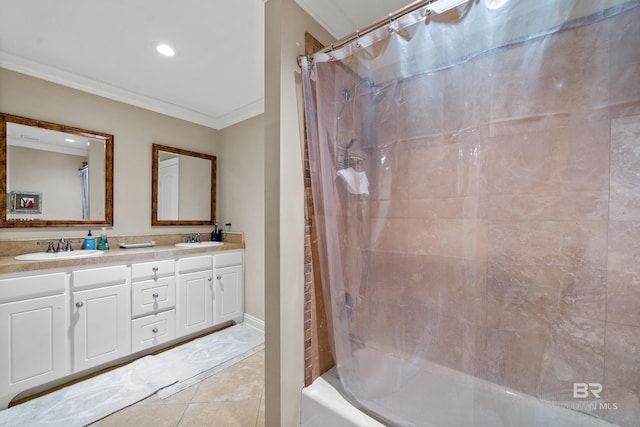 full bathroom featuring tile patterned floors, double vanity, crown molding, and a sink