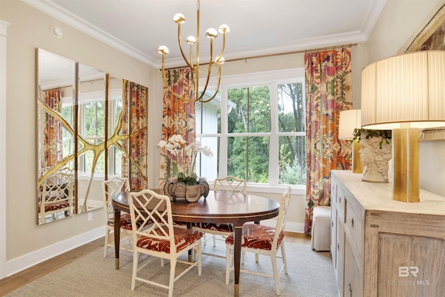 dining room with ornamental molding and a healthy amount of sunlight