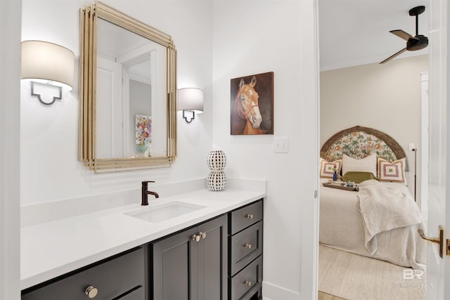 bathroom with crown molding and vanity