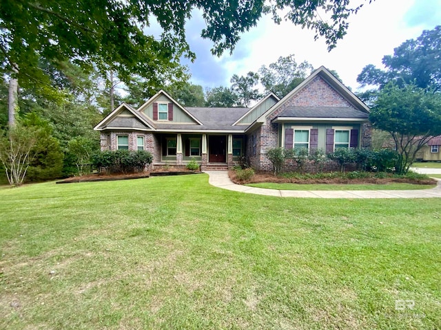 craftsman inspired home with covered porch and a front lawn