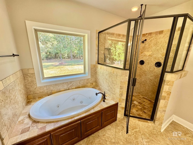 bathroom featuring plus walk in shower