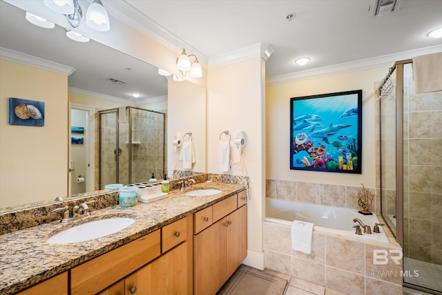 bathroom featuring a sink, visible vents, ornamental molding, double vanity, and a stall shower