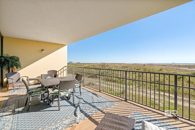 balcony with outdoor dining area