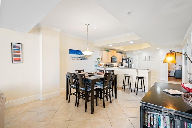 dining area with recessed lighting, crown molding, baseboards, and light tile patterned floors