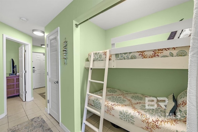 bedroom featuring tile patterned flooring