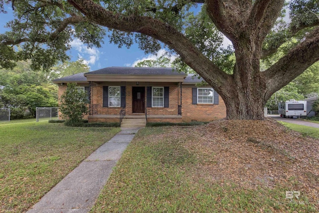 2774 N Grafhill Dr, Mobile, AL 36606 - view of front facade with brick siding and a porch