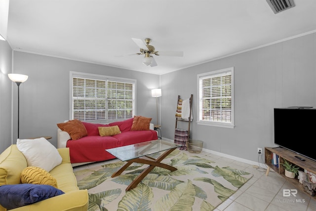 2774 N Grafhill Dr, Mobile, AL 36606 - living room with plenty of natural light, a ceiling fan, tile patterned flooring, and ornamental molding