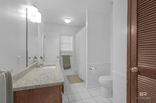 2774 N Grafhill Dr, Mobile, AL 36606 - full bath with tile patterned flooring, vanity, curtained shower, and a closet