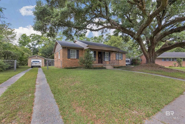 2774 N Grafhill Dr, Mobile, AL 36606 - ranch-style house featuring driveway, a detached garage, brick siding, covered porch, and an outdoor structure