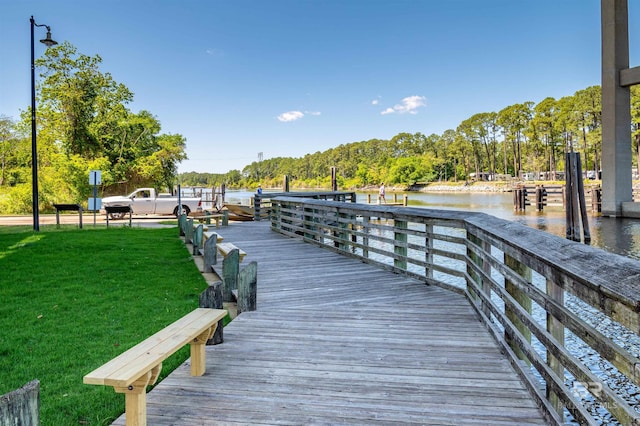 657 Island Way, Gulf Shores, AL 36542 - dock with a water view and a yard