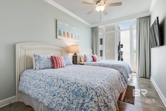 tiled bedroom featuring baseboards, a ceiling fan, and crown molding